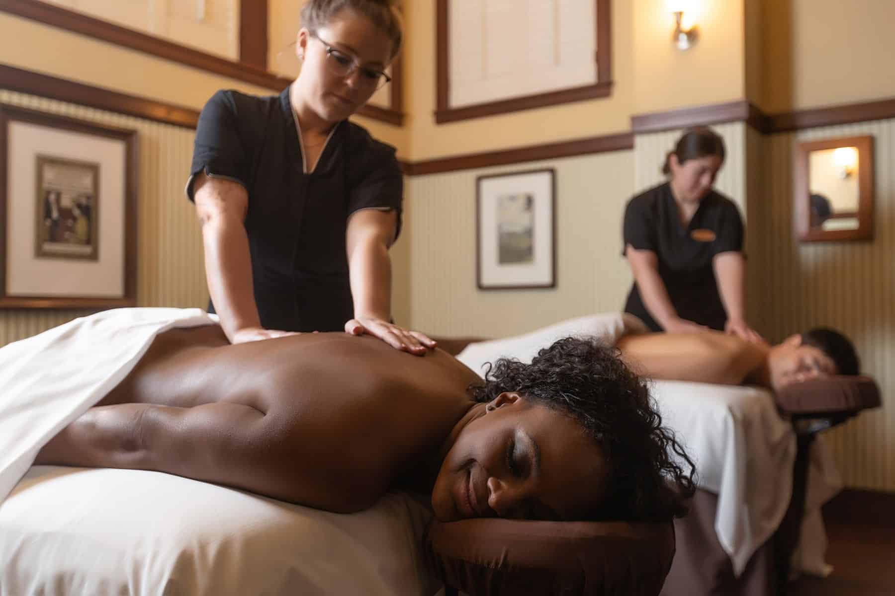 couple enjoying a relaxing couples massage at Pinehurst Spa
