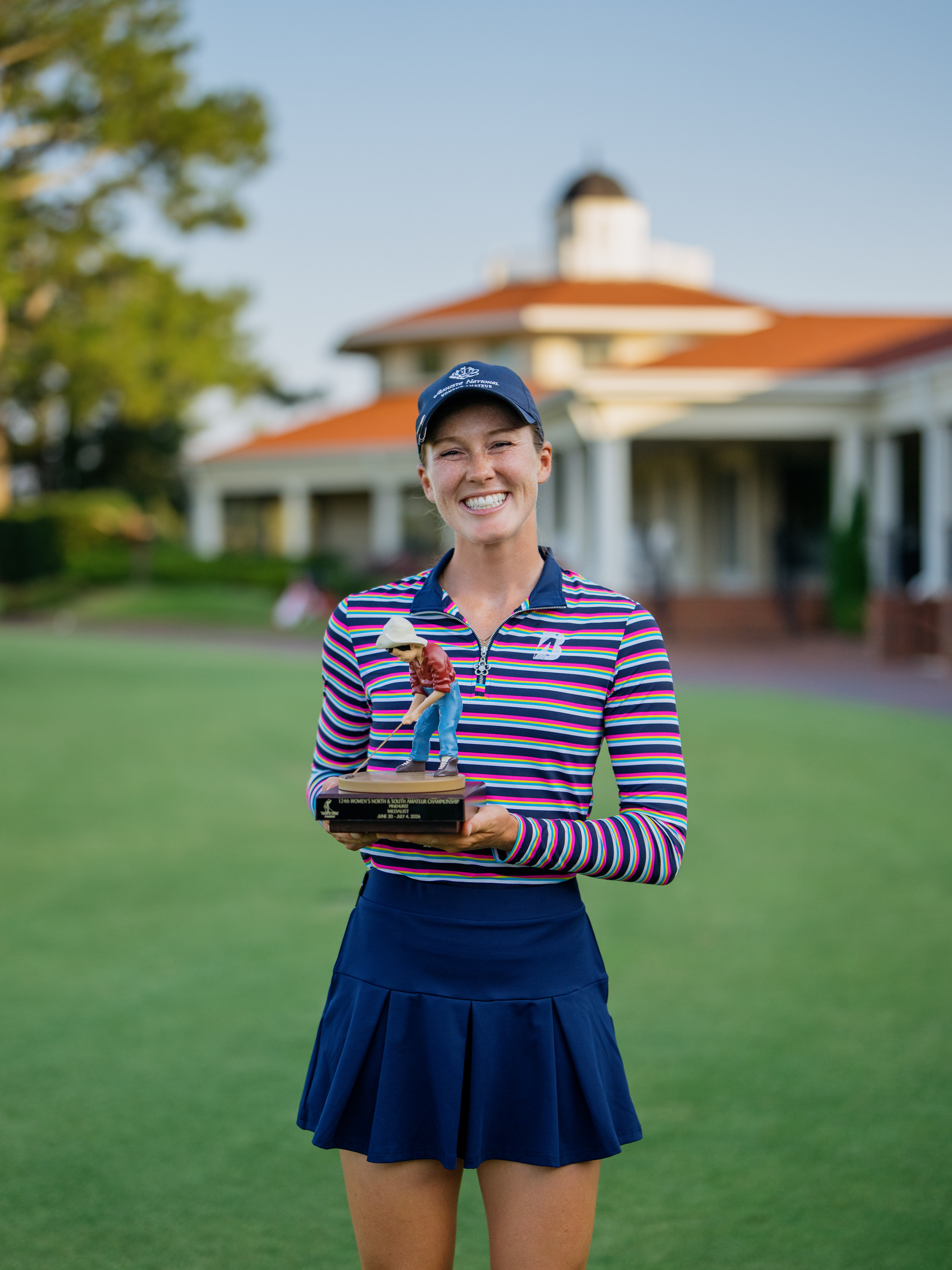 Emilia Doran poses with the medalist trophy for the 124th Women's North & South Amateur on Wednesday.